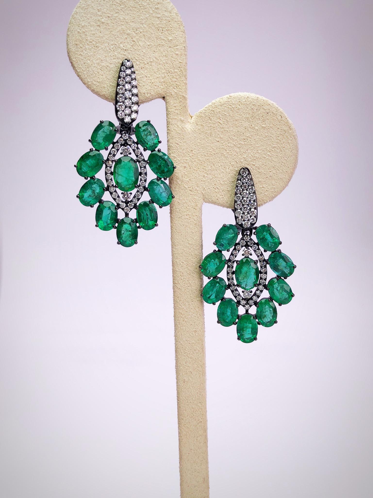 These drop earrings from Sutra are composed of 15.92 carats of oval emeralds and 1.60 carats of round brilliant diamonds. Set in 18-karat blackened white gold. The earrings are 1.5