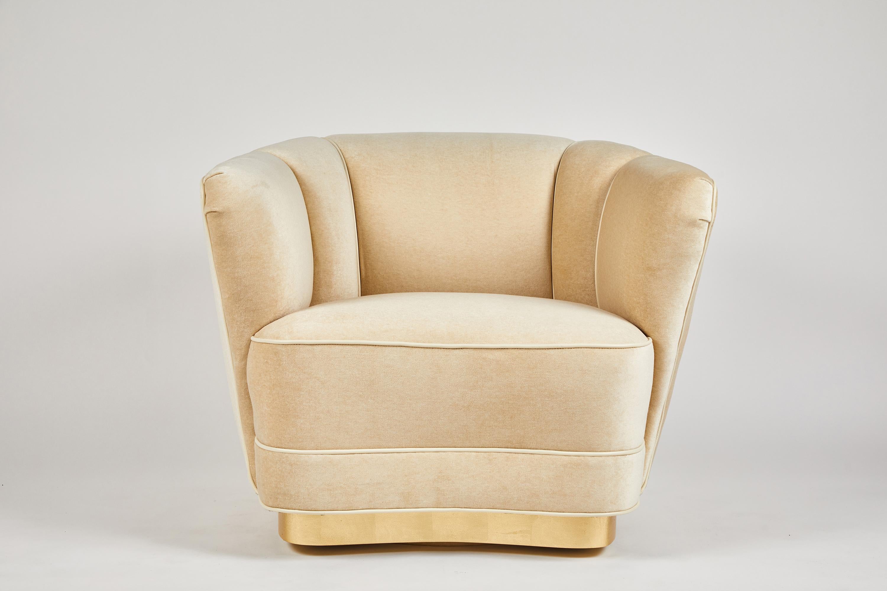 Dragonette limited introduces the Sutton place club chair. A beautiful and elegant design, as shown the swiveling version on a gold-leafed base. Fully customizable, including a footed version. Price is COM.