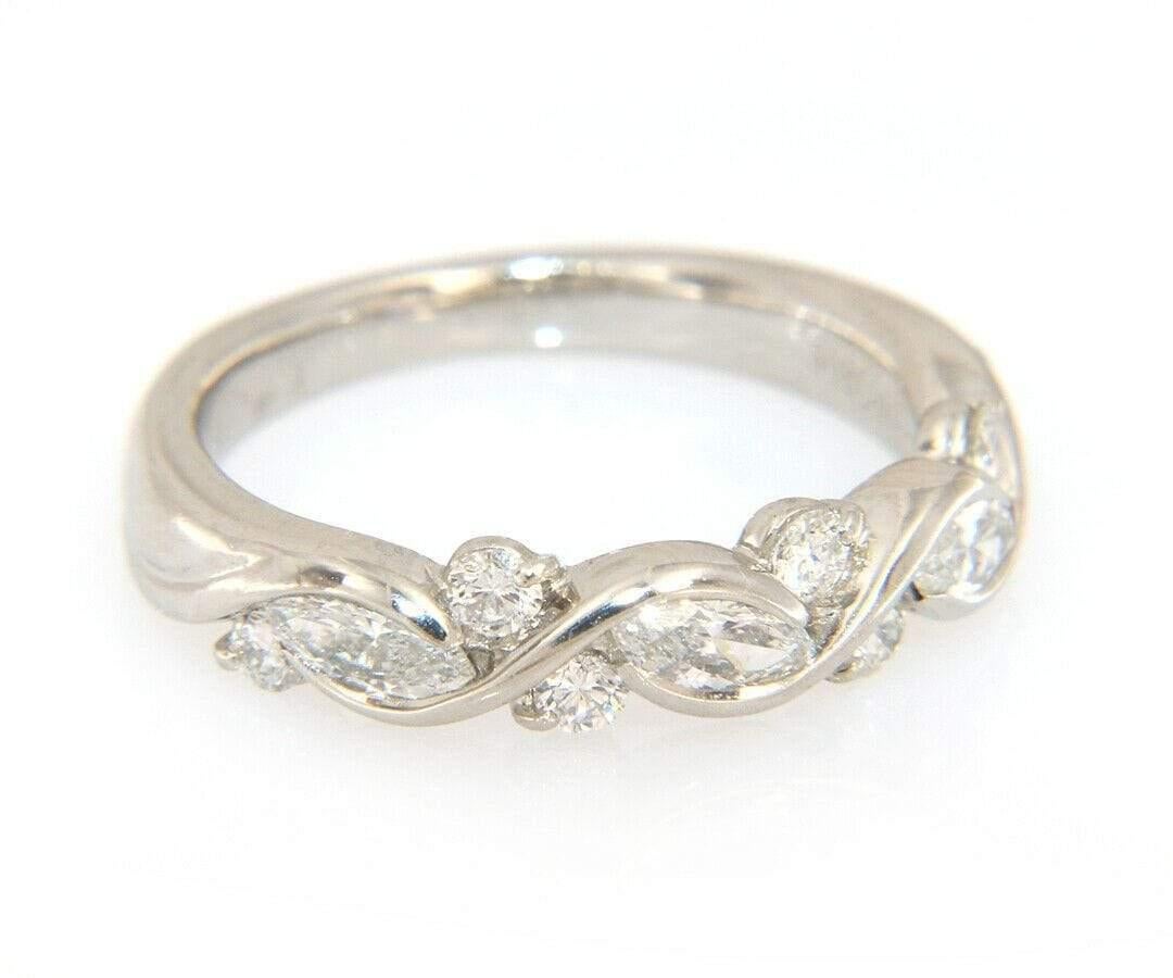SUWA Marquise and Round Diamond Anniversary Band Ring in Platinum

SUWA Marquise and Round Diamond Anniversary Band Ring
.950 Platinum
Diamonds Carat Weight: Approx. 1.00ctw
Ring Size: 4.50 (US)
Weight: Approx. 5.30 Grams
Stamped: SUWA, PT950,