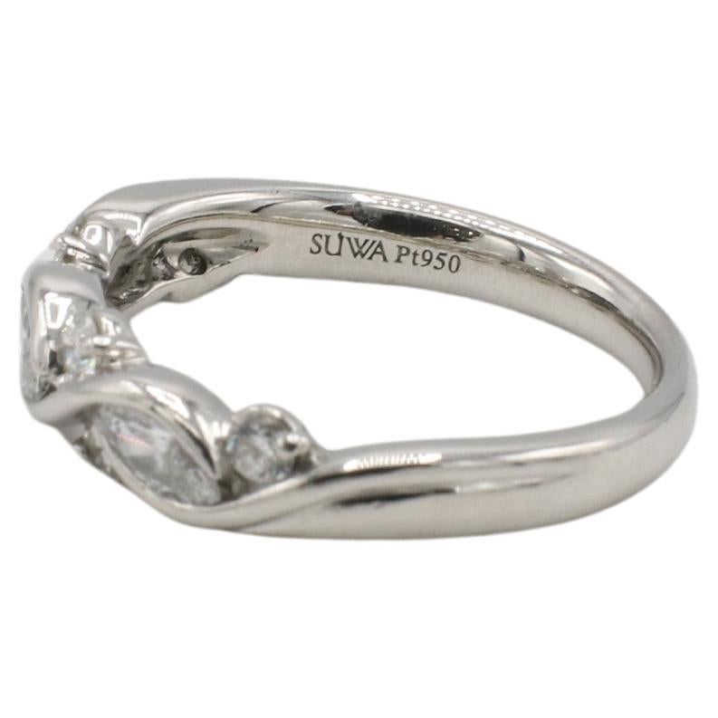 SUWA Alianza de Platino con Diamante Natural en Torsión 
Metal: Platino
Peso: 5.42 gramos
Diamantes: Diamantes naturales marquesa y redondos aprox. 0,50 CTW G VS
Talla: 6 (US)
Anchura: 4.5 mm
Altura: 3 mm
ATD F35001010
