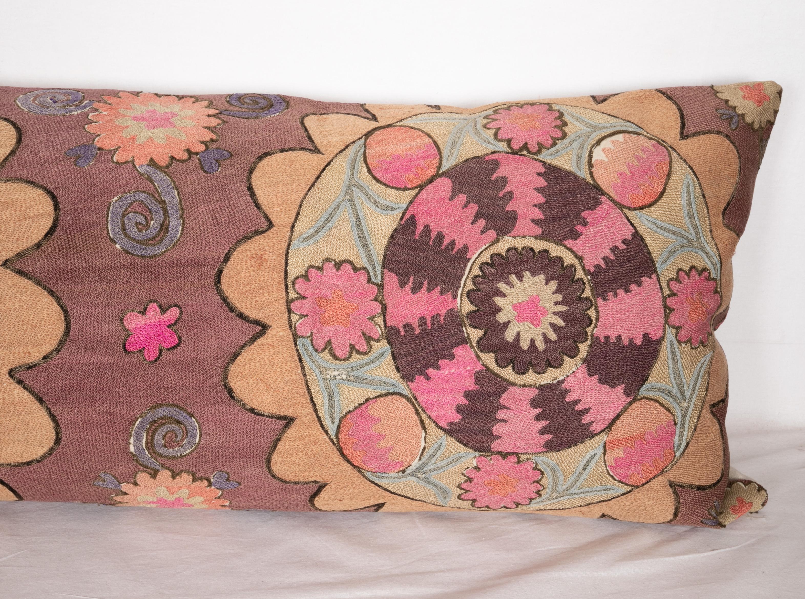 Embroidered Suzani Body Pillow Fashioned from a Tashkent Suzani, Uzbekistan