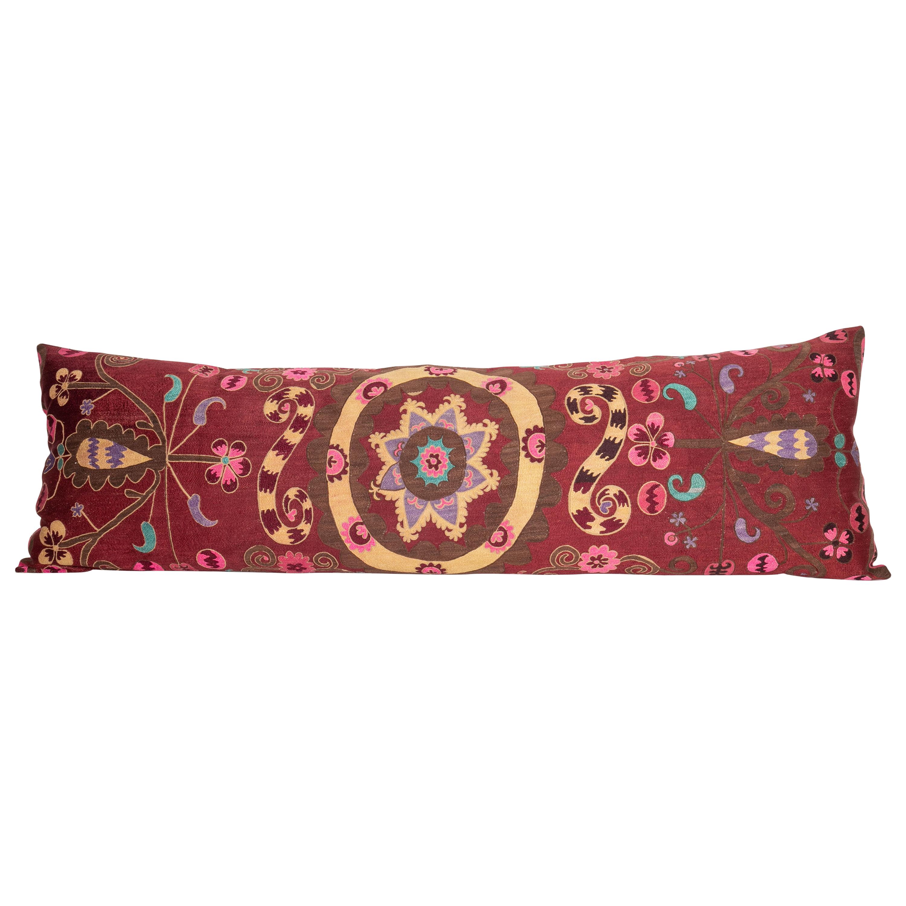 Suzani Body Pillow Fashioned from a Tashkent Suzani, Uzbekistan, 20th Century