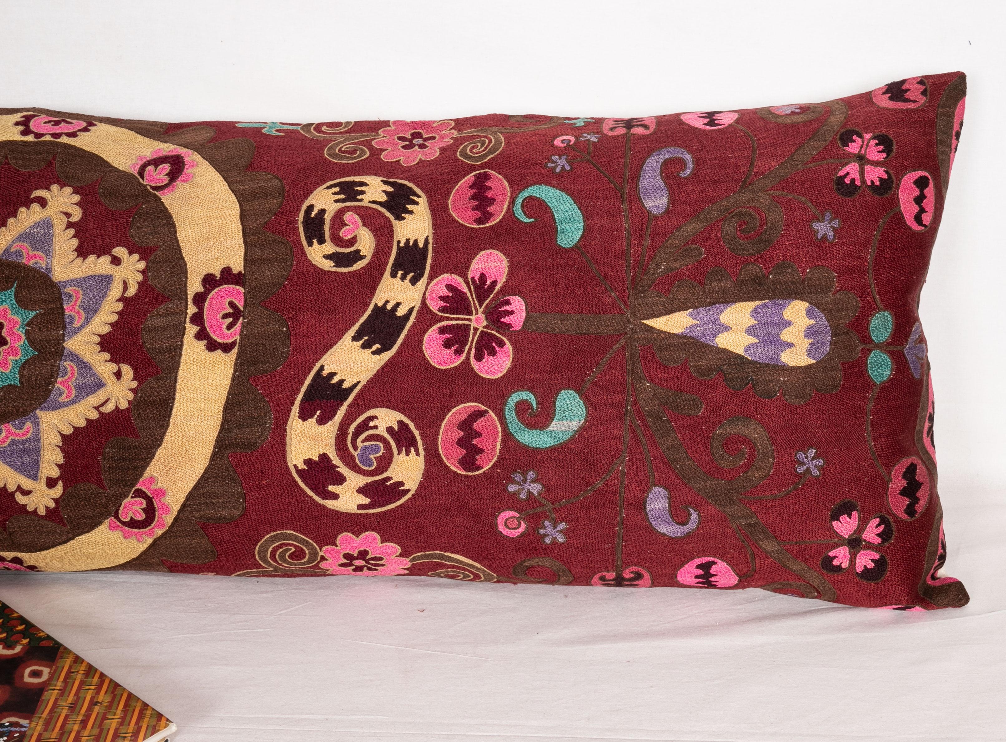 Embroidered Suzani Body Pillow Fashioned from a Tashkent Suzani, Uzbekistan, 20th Century
