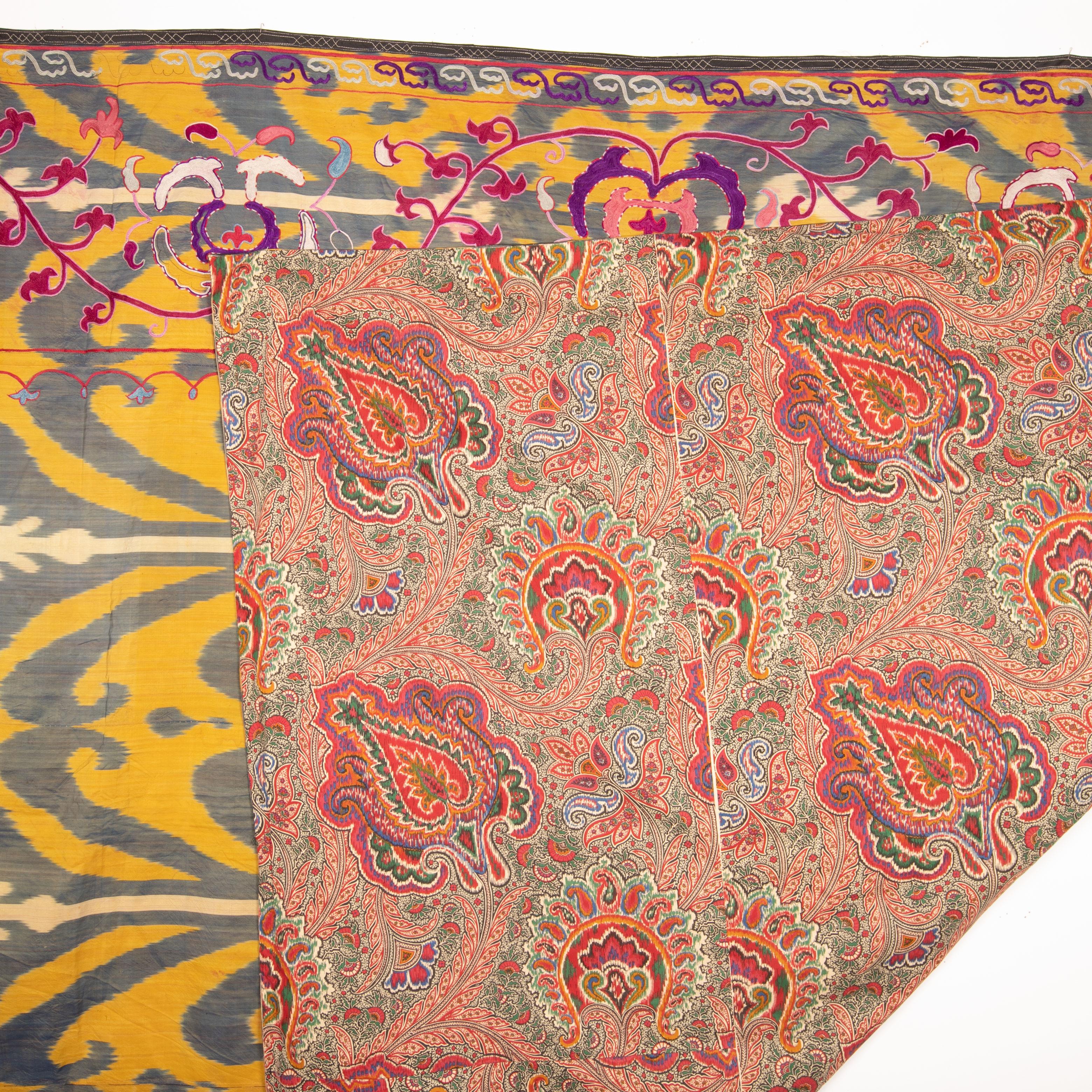 Suzani done on silk Ikat, Uzbekistan, early. 20th c. 1