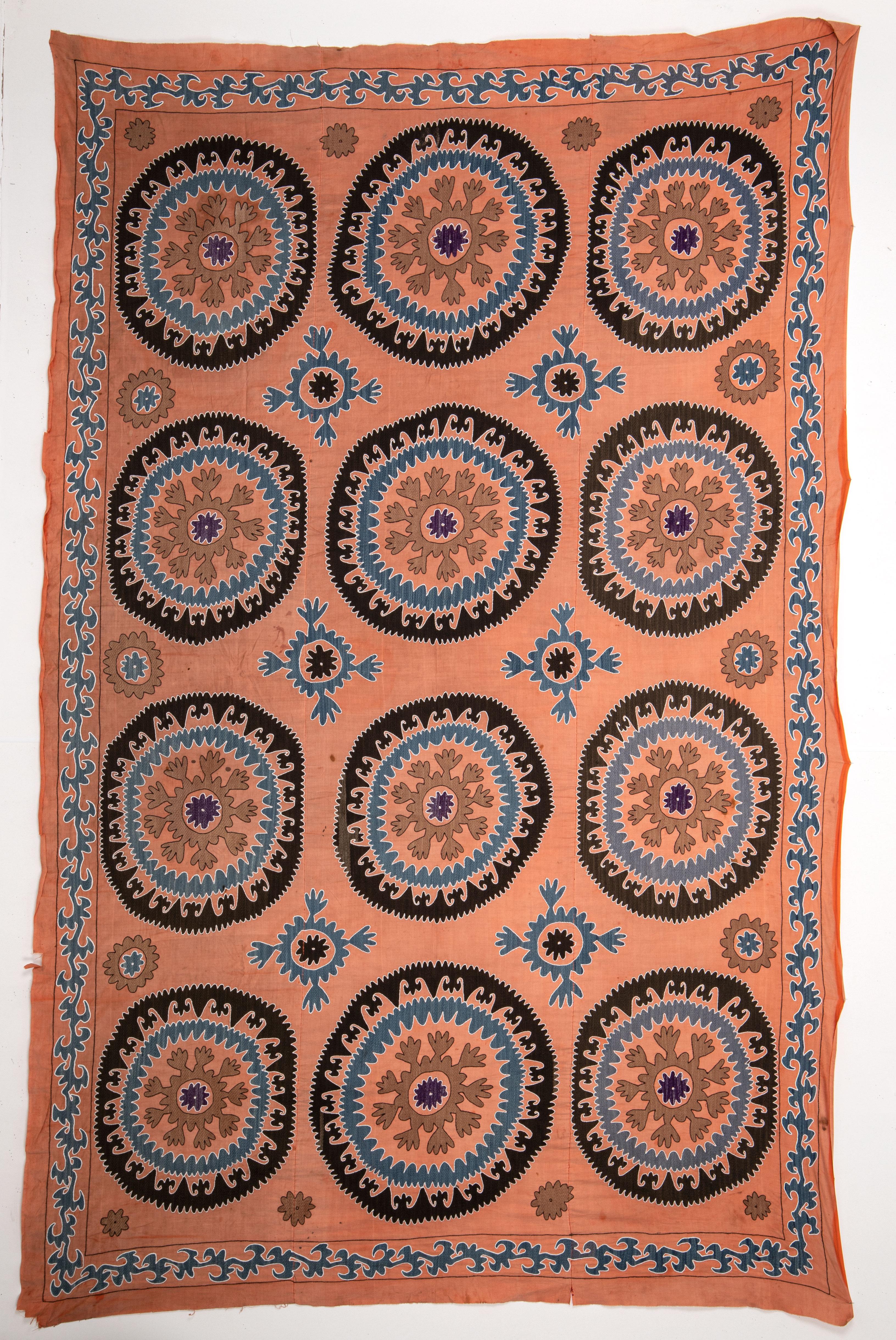 A suzani from Samarkand with an unusal background color. 1960s.
