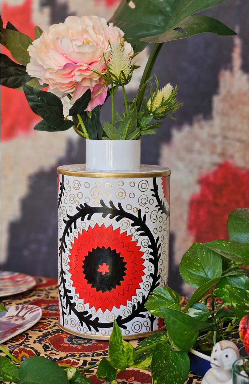 Elevate your decor with this stunning Suzani hand-painted vase, crafted on iron with intricate detailing. Inspired by traditional Suzani patterns, this vase is more than just a decorative piece—it’s a work of art that brings vibrant color and