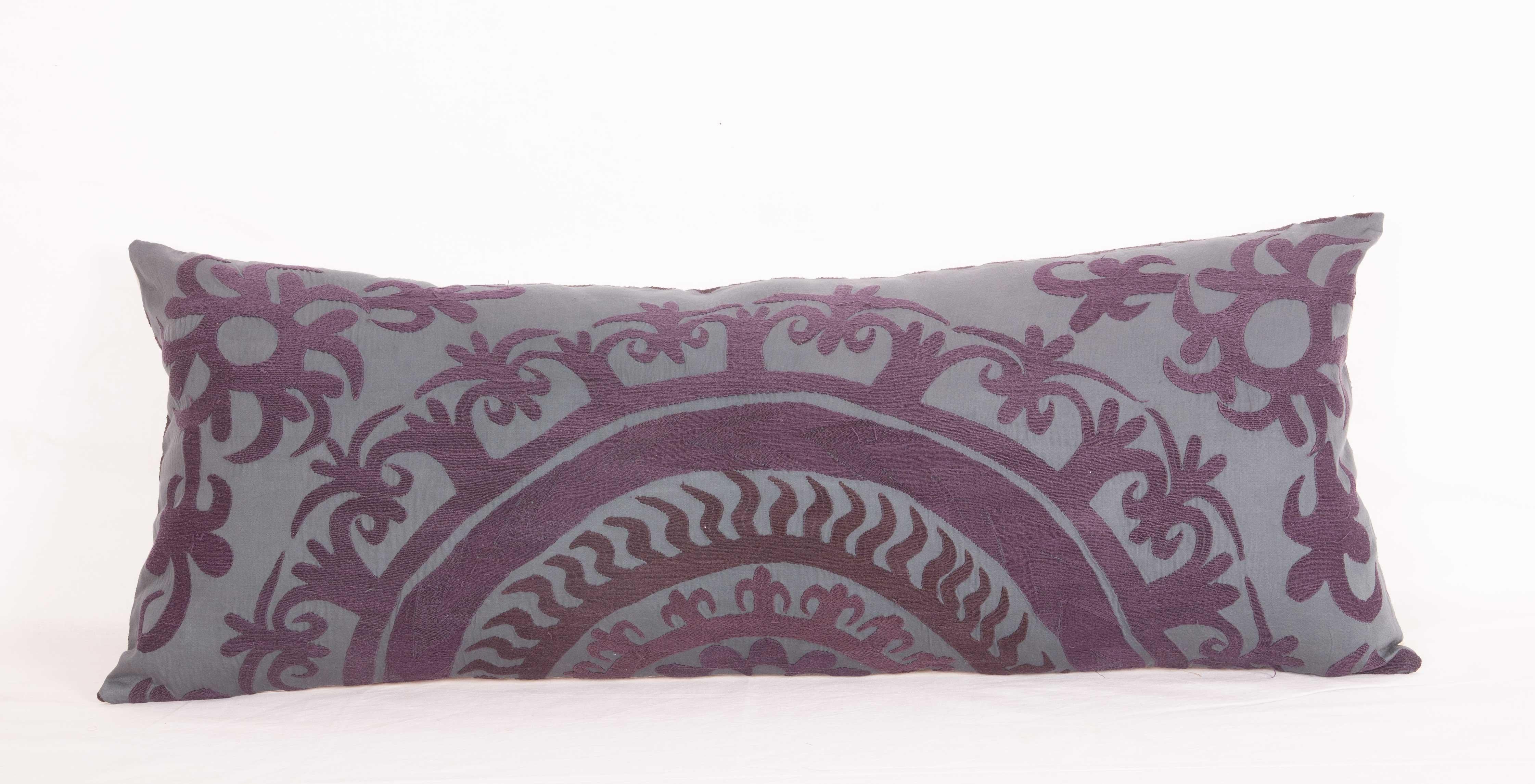 Uzbek Suzani Lumbar Pillow Cases Fashioned from a Vintage Over Dyed Suzani For Sale
