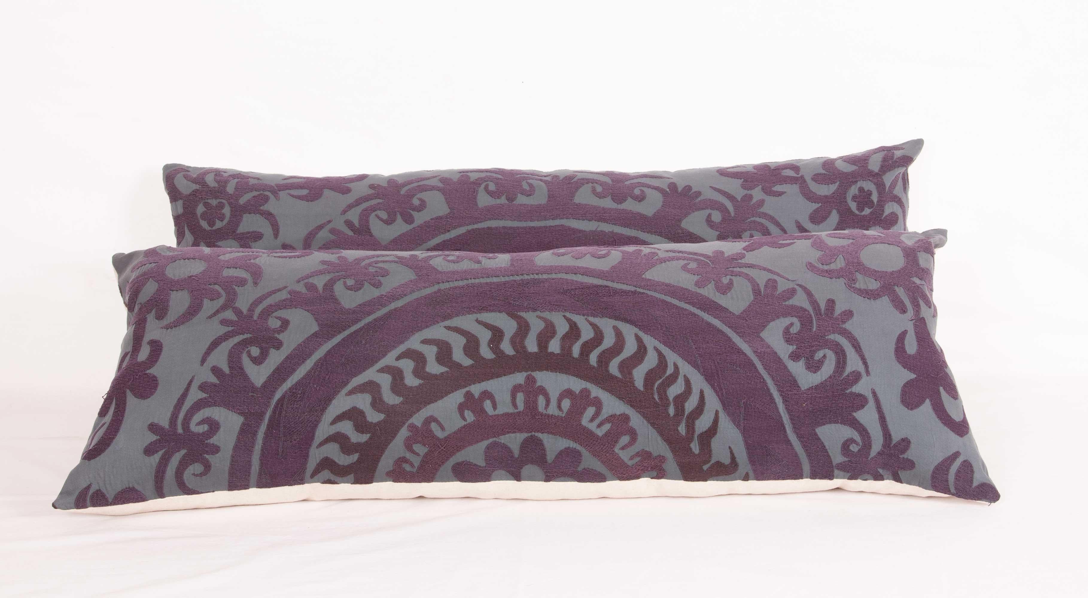 20th Century Suzani Lumbar Pillow Cases Fashioned from a Vintage Over Dyed Suzani For Sale