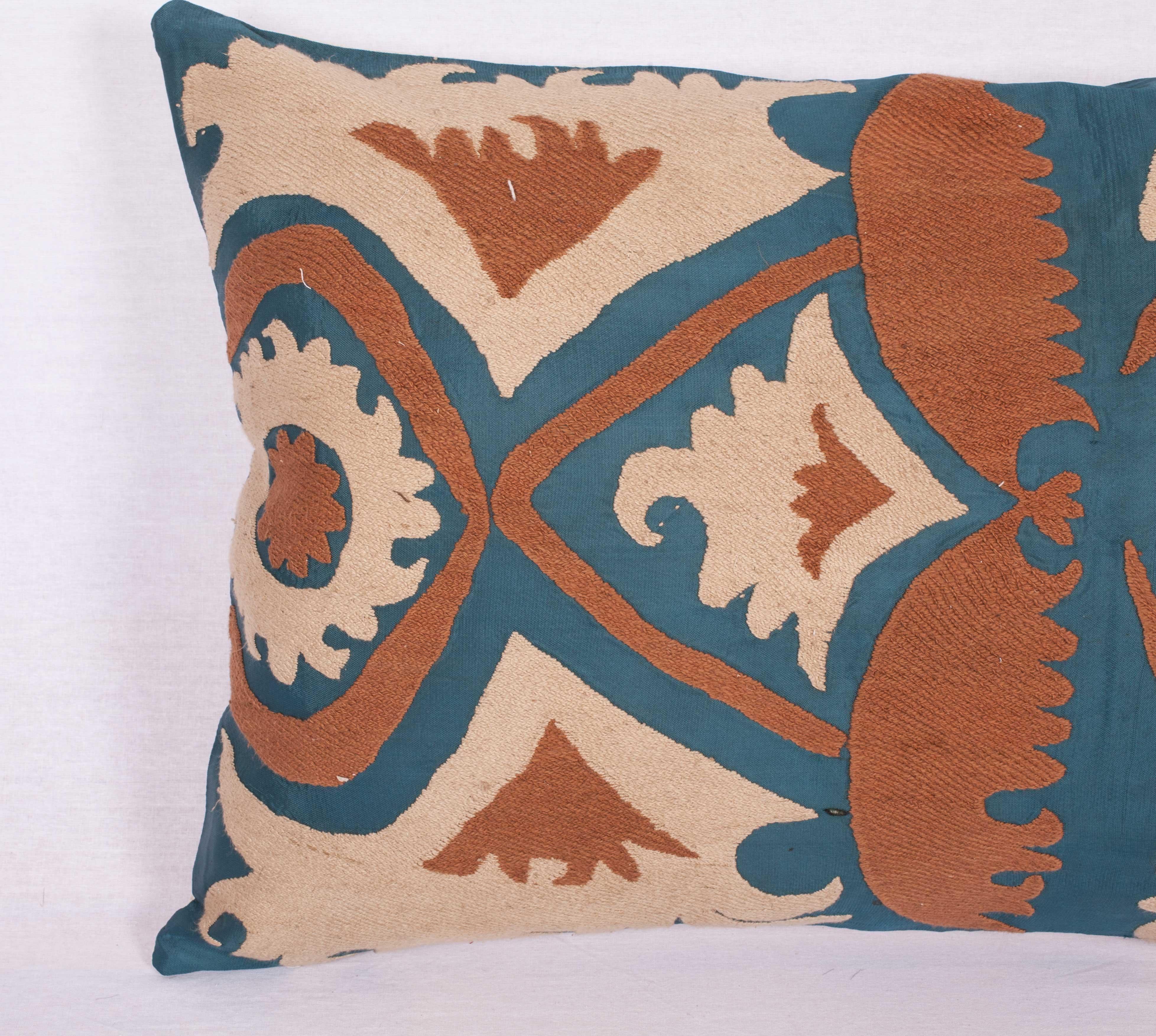 The pillow is made from a vintage Uzbek Samarkand Suzani. It does not come with an insert but comes with a bag made to the size and out of cotton to accommodate the filling. The backing is made of linen. Please note filling is not provided. Since