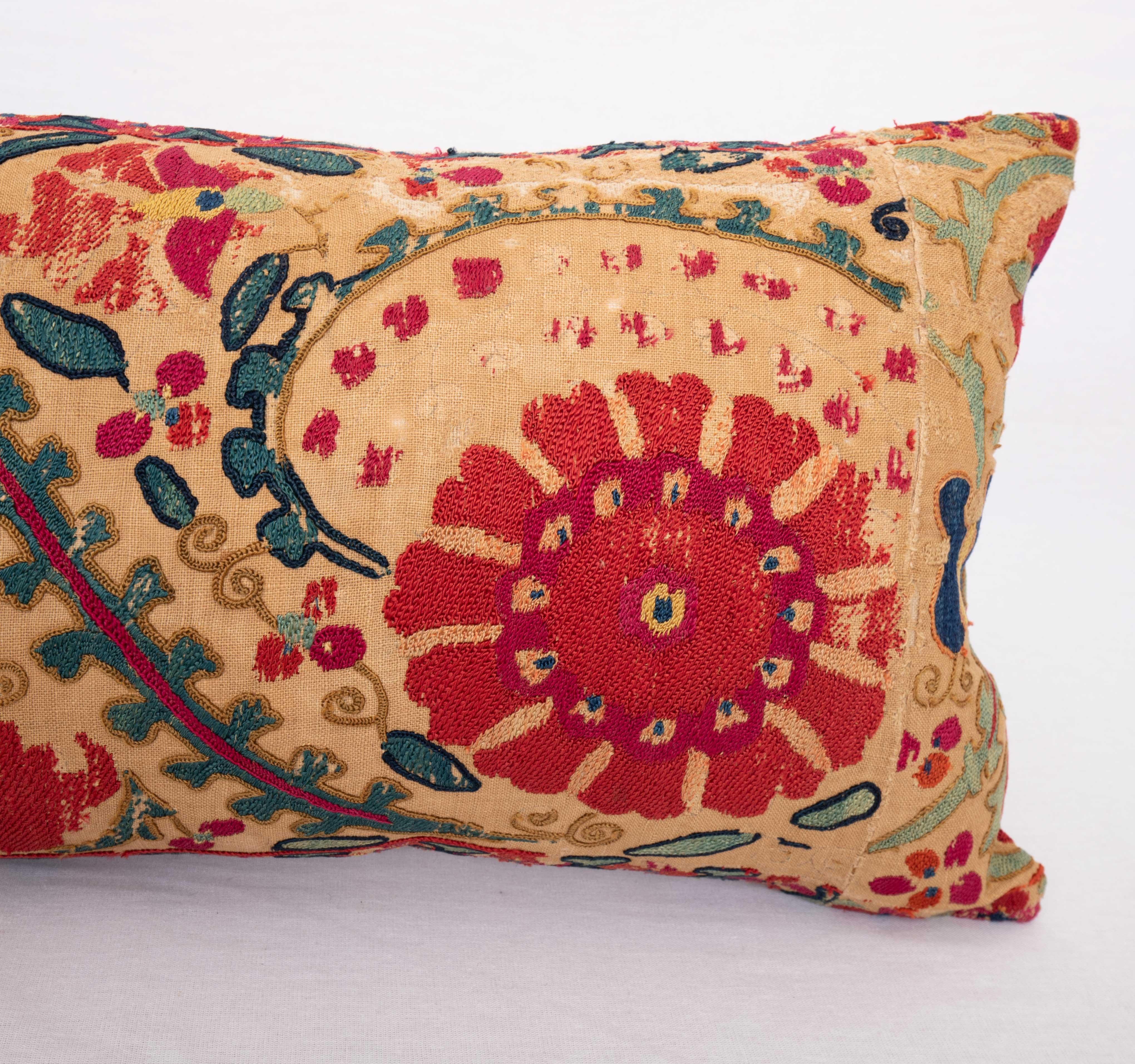 Embroidered Suzani Pillow Case made from an Antique suzani Fragment, 19th C.