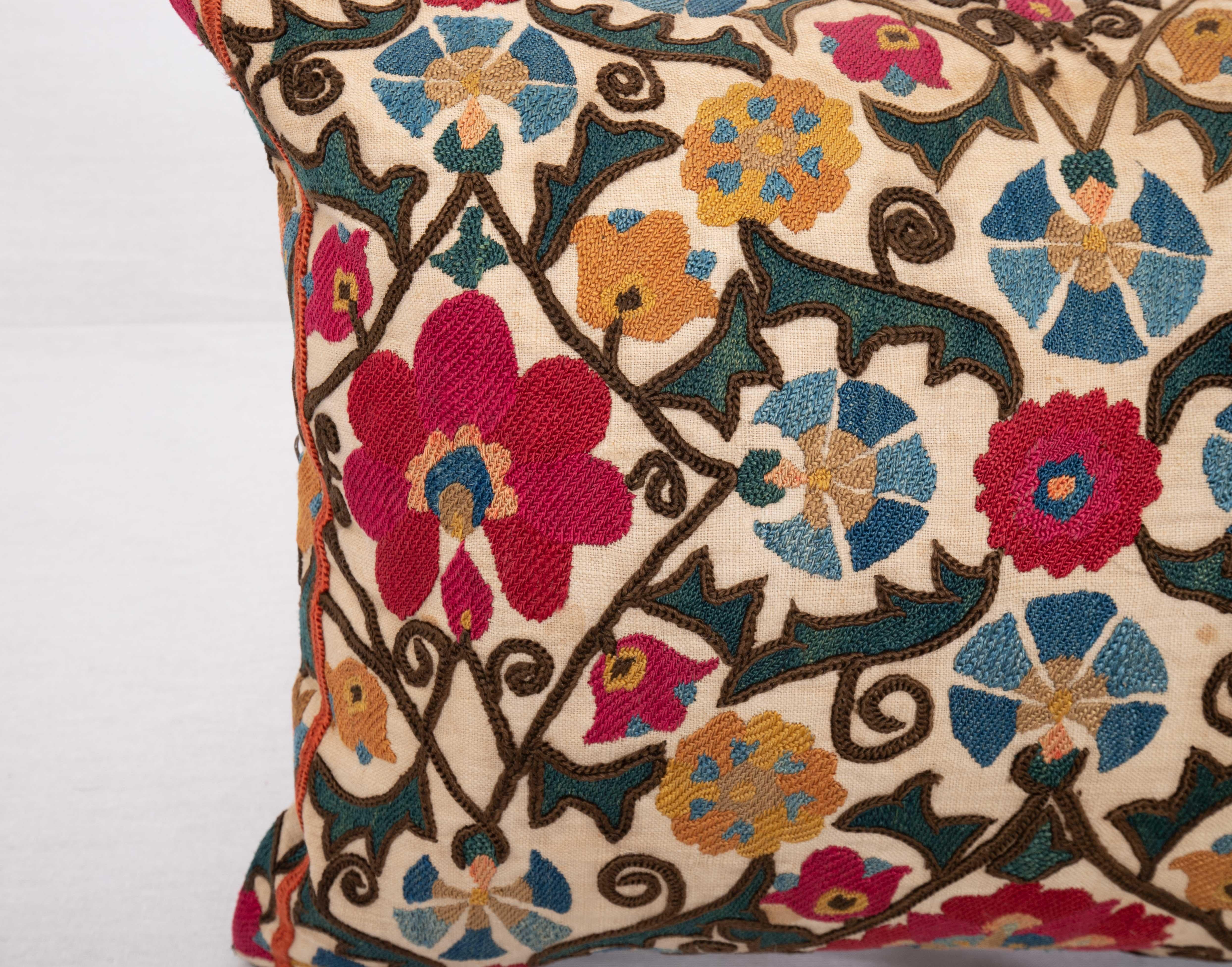 Embroidered Suzani Pillow Case made from an Antique suzani Fragment, 19th C.