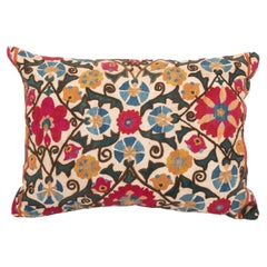 Suzani Pillow Case made from an Antique suzani Fragment, 19th C.