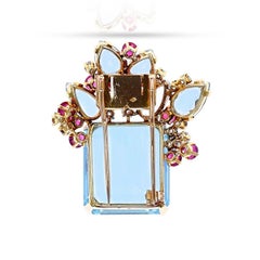 Suzanne Belperron Brosche, Aquamarin, Rubin und Diamanten, 18k