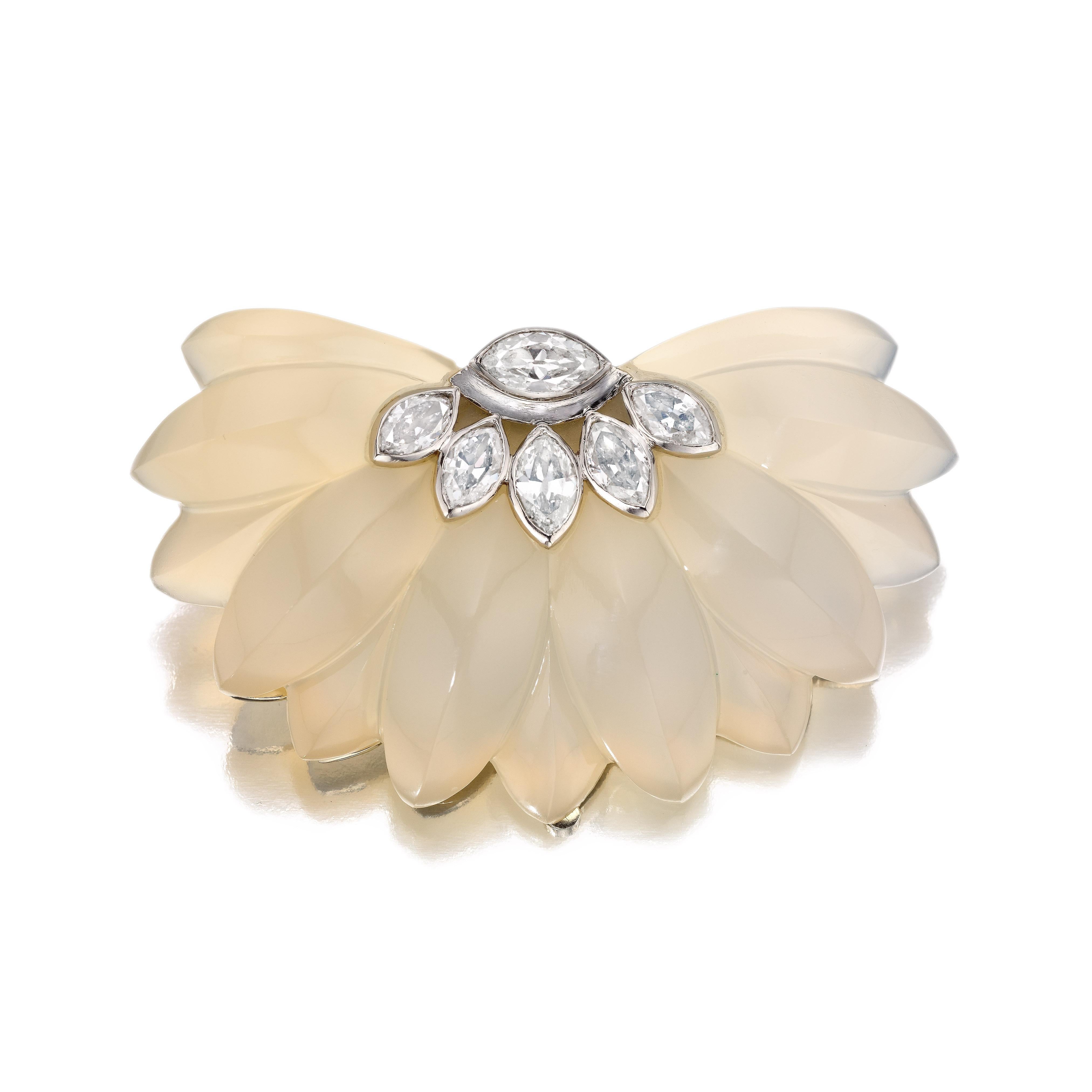 Art Deco Chalcedony and Diamond Demi-Marguerite Brooch by Suzanne Belperron, Paris, circa 1945

A brooch composed of a stylized carved chalcedony flower set with diamonds; mounted in platinum, with 18-karat gold clip with French assay marks
• 6