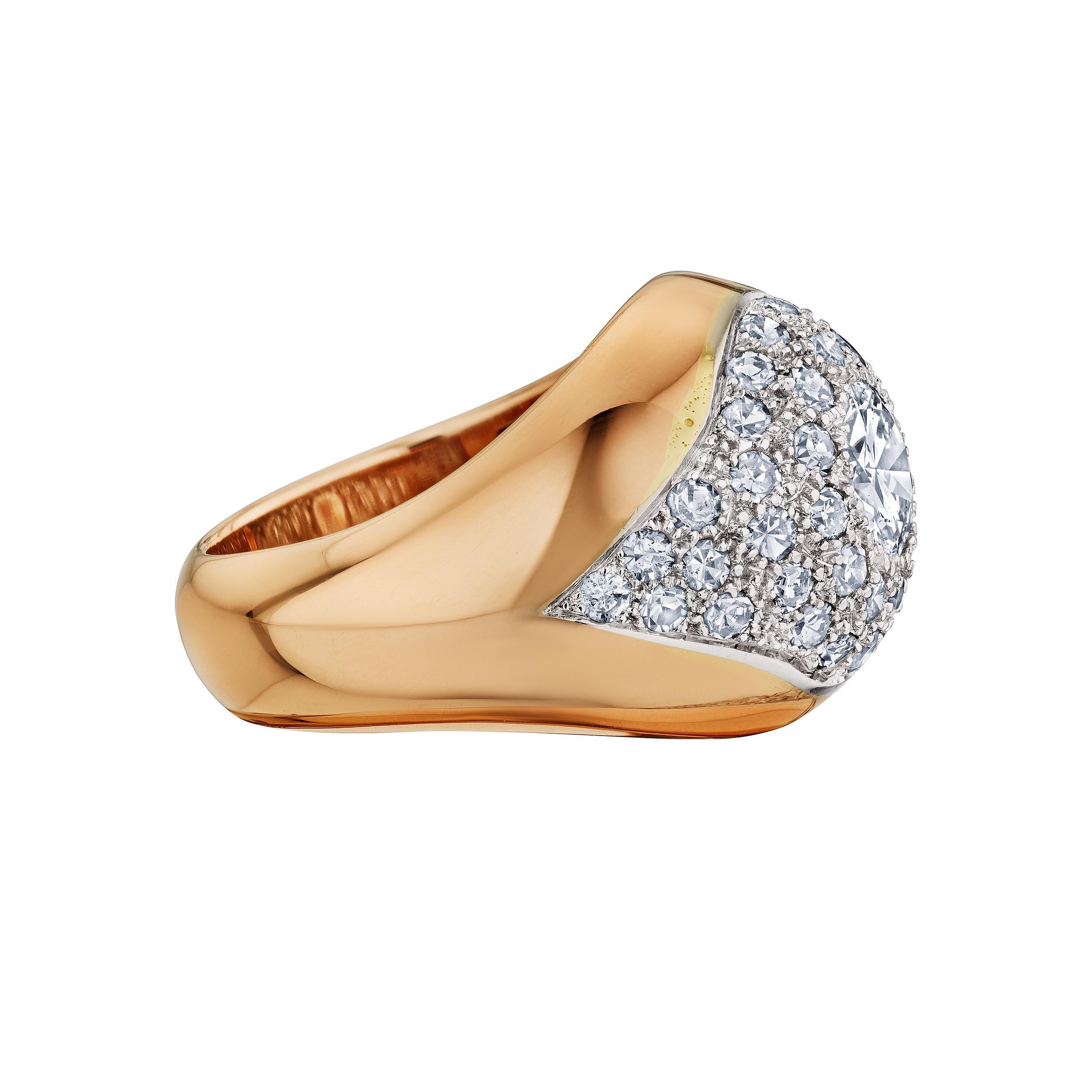 Innately stately this mid-century Suzanne Belperron Paris 18 karat yellow gold dome ring features a lozenge-shaped platinum pattern pave-set with vintage cut diamonds.  Circa 1945.  Certificate of authenticity by Belperron expert Olivier Baroin