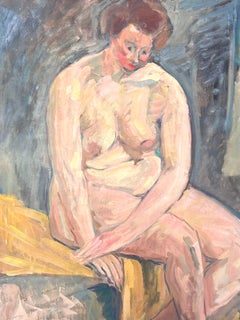 Porträt einer nackten Frau, die auf einer gelben Decke sitzt und nach unten schaut Französische Malerei