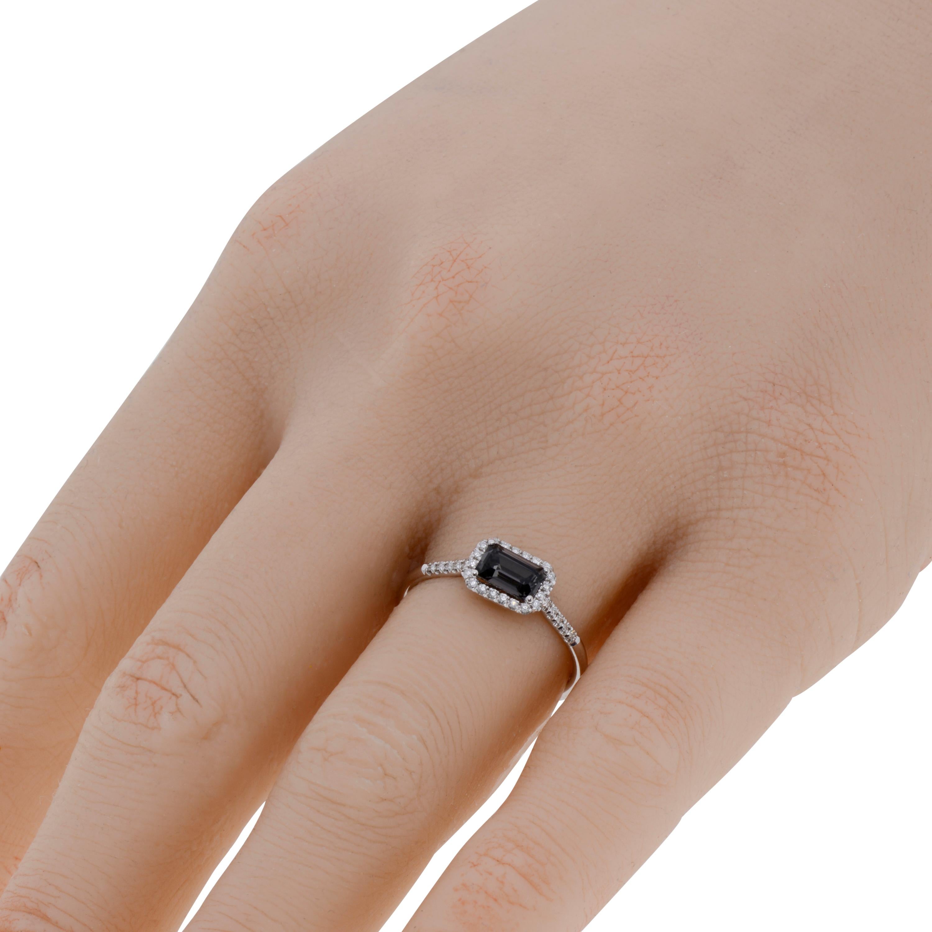 This glittering Suzanne Kalan 14K White Gold Band Ring features 0.14ct. tw. pave diamonds shimmering with an emerald cut Black Night Quartz center. The ring size is 6.25 (52.6). The Decoration Size is 6mm x 4mm. The Weight is 1.6g.

