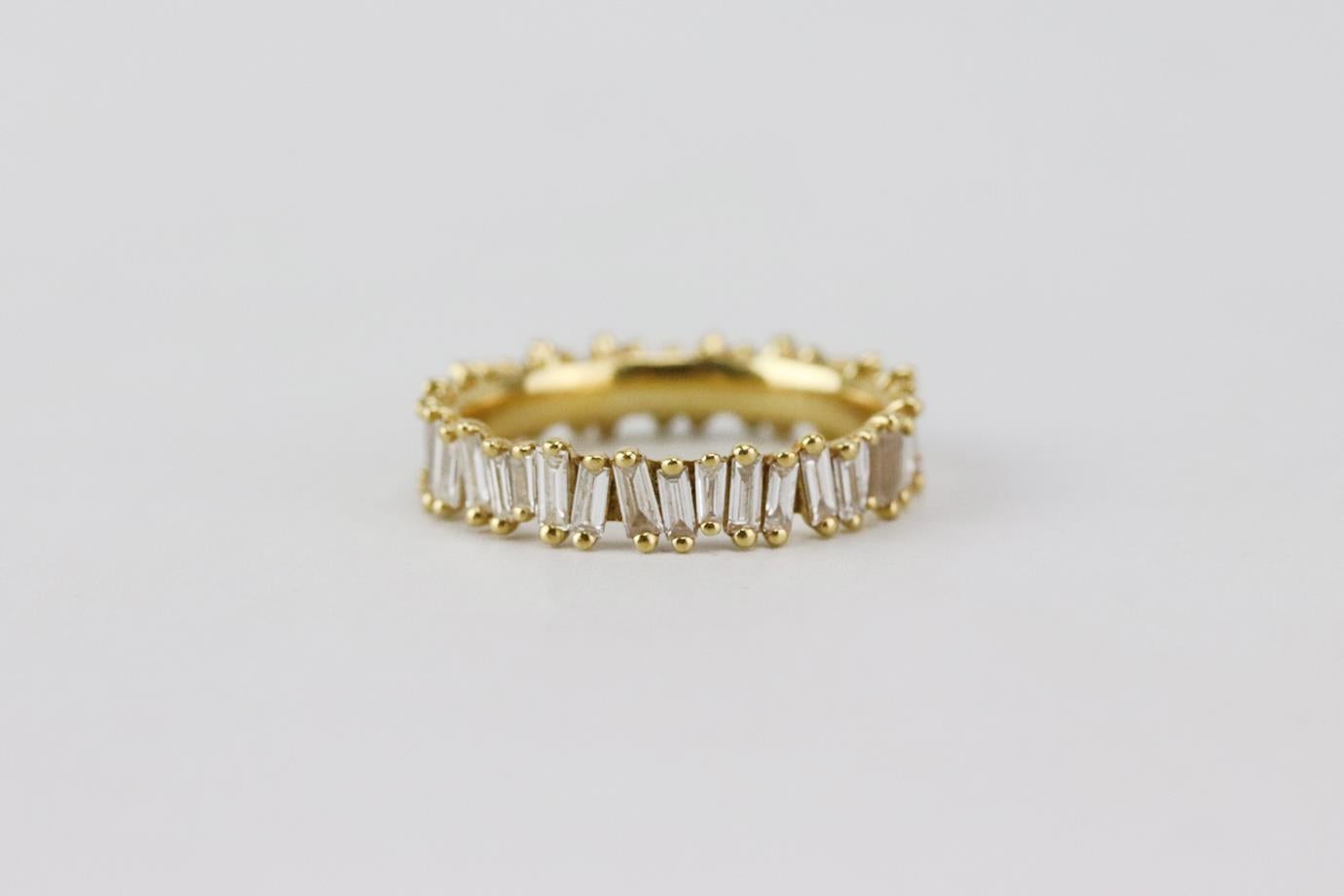 Suzanne Kalan Eternity Band 18k yellow gold and baguette diamond ring. Made from 18k yellow-gold with 40 baguette-diamonds weighing 1.60 cts. Yellow-gold. Does not come with box or dustbag. Ring Size: 16.5 mm. Width: 4 mm
