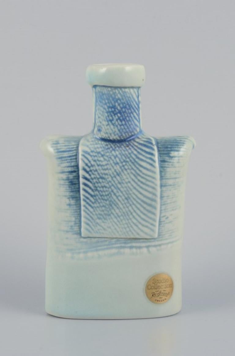 Scandinavian Modern Suzanne Öhlén for Rörstrand. Porcelain vase with glaze in blue tones. For Sale