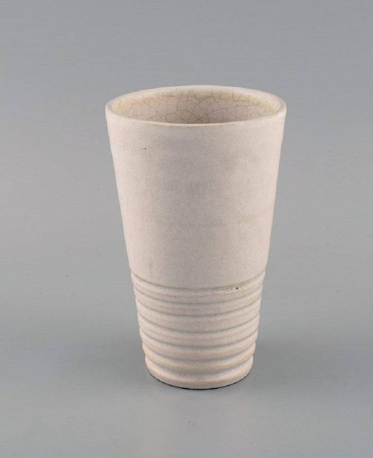 Suzanne Ramie (1905-1974) for Atelier Madoura. 
Unique Art Deco vase in glazed stoneware. Beautiful crackled glaze in sand shades. Mid-20th century.
Measures: 14.8 x 9.2 cm.
In excellent condition.
Stamped.

Suzanne Ramié (1905-1974) is best