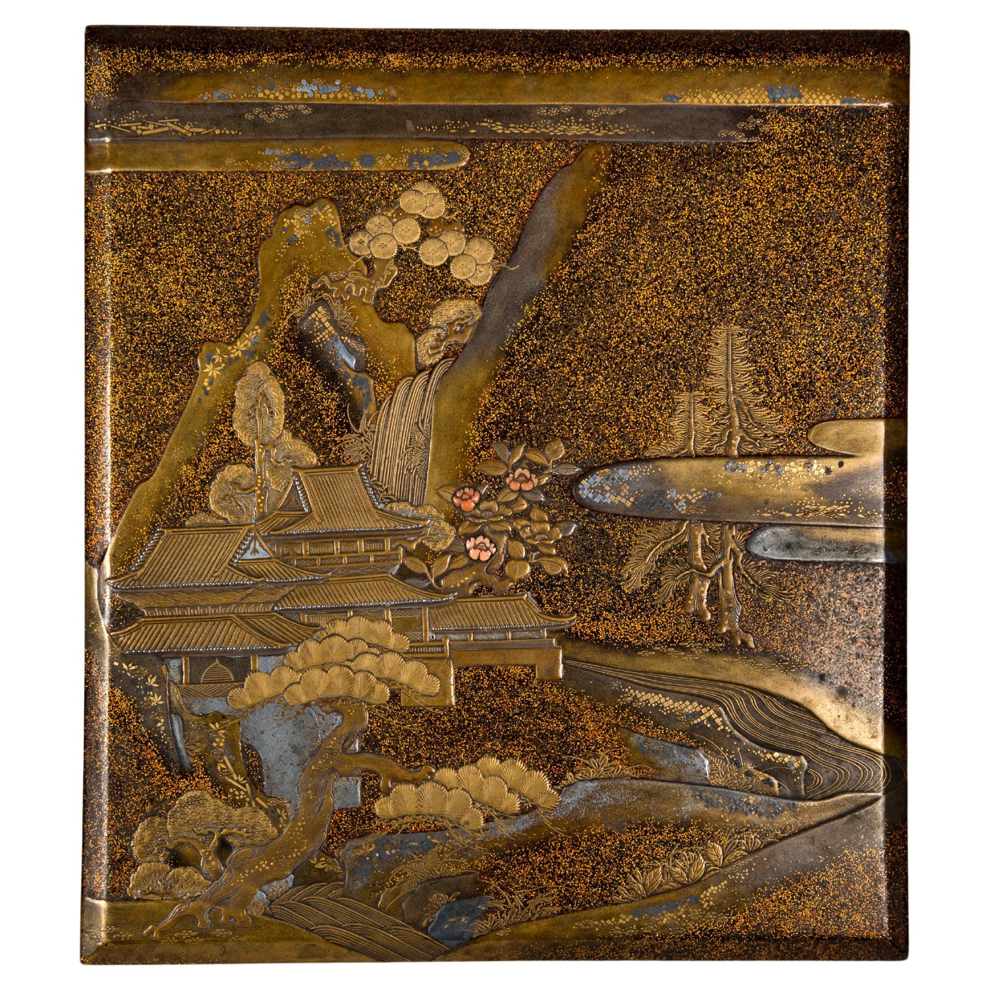 Suzuribako or writing box made of nashiji lacquer and adorned with a landscape