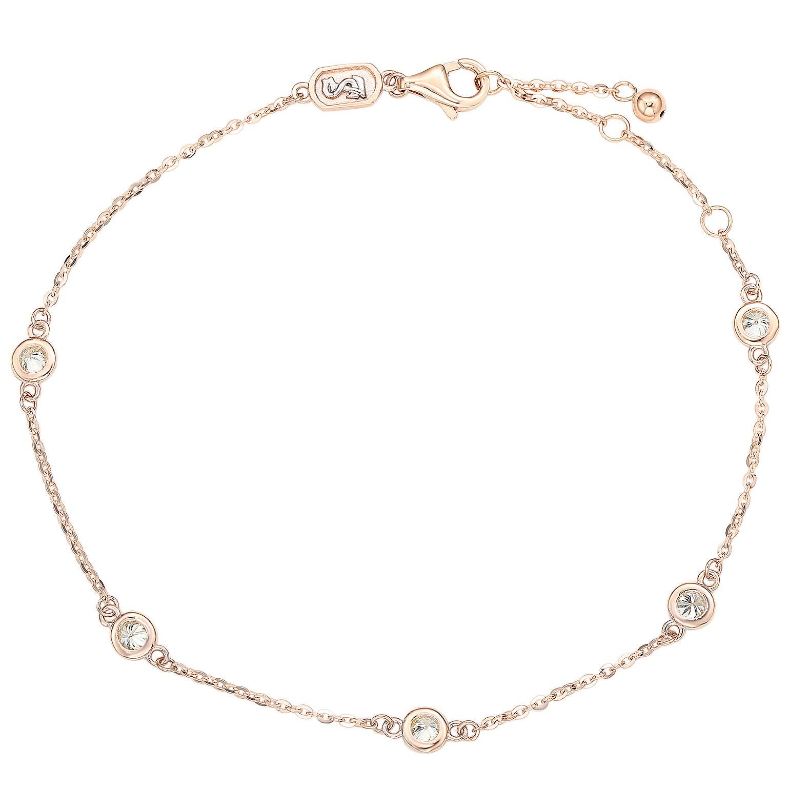 Ajoutez de l'éclat à votre poignet avec ce magnifique bracelet à station de diamants de Suzy Levian. Ce magnifique bracelet arbore 5 diamants brillants de taille ronde dans une lunette exquise ornée d'or rose 14 carats. Ce bracelet présente une