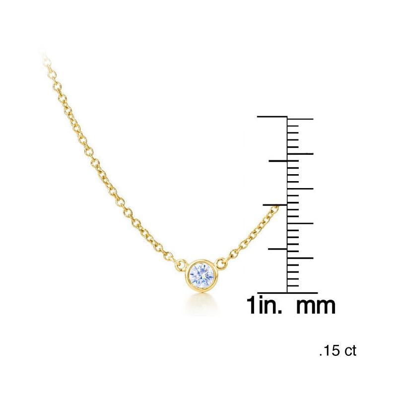 This magnificent pendant boasts a brilliant round-cut diamond in an exquisite bezel adorned of 14-karat yellow gold. The shimmering diamond gemstone is gloriously set in its bezel pendant. This gorgeous necklace features a 18 inch cable chain with a