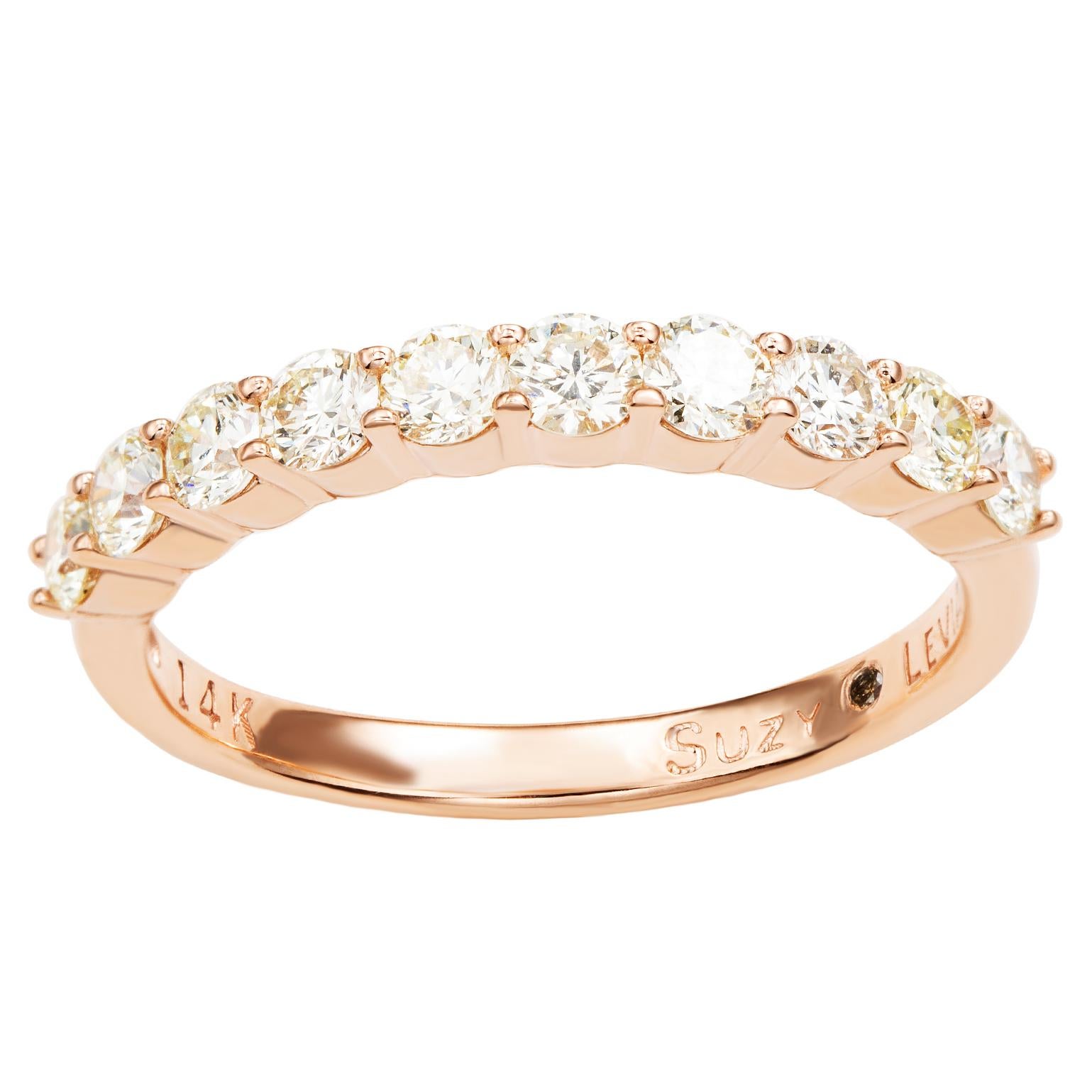 This elegant Suzy Levian diamond half eternity band features a total of ten round cut diamonds (G-H, S1-S2). The diamonds sparkle along half the eternity band, for a sparkle you can't miss with a comfort fit. Designed by Suzy Levian , this 14k rose