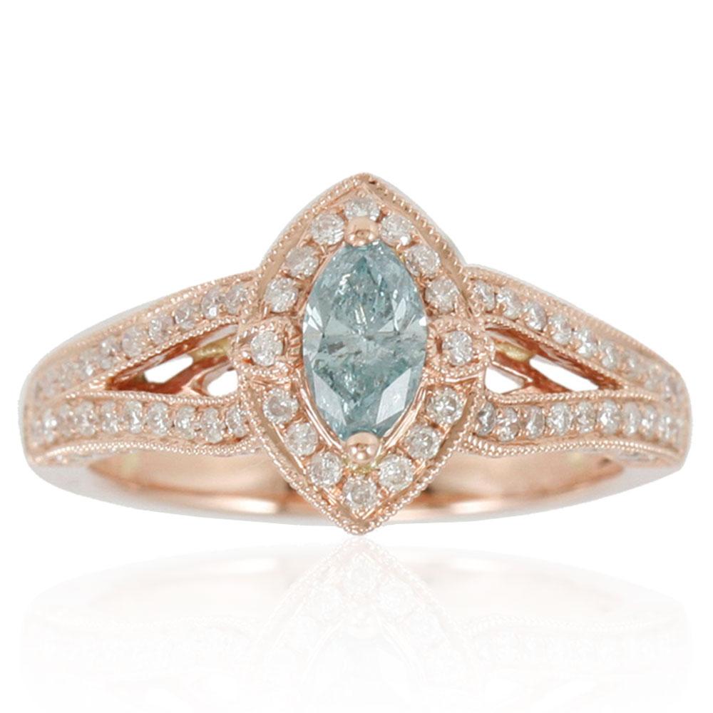 This spectacular ring from the Suzy Levian's Limited Edition collection features a gorgeous marquise-cut, baby blue diamond (.45ct) center stone with an array of white diamond (.71cttw) accents, handset in a 14 karat rose gold setting. French
