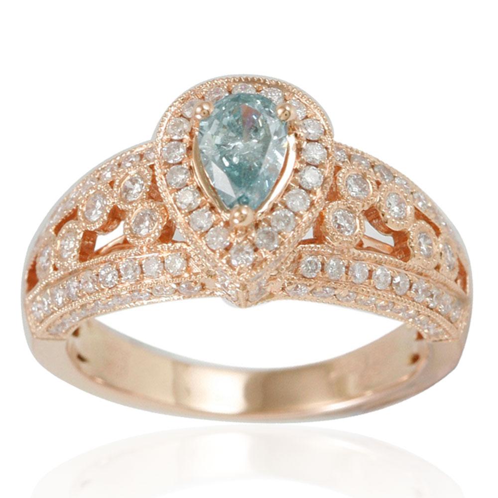 This stunning, one-of-a-kind ring from the Suzy Levian Limited Edition collection features a gorgeous pear-cut, light blue diamond (.44ct) center stone with an array of white diamond (.94cttw) accents, handset in a 14k rose gold setting. French