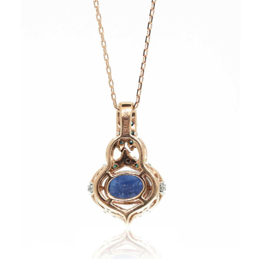 This spectacular pendant from the Suzy Levian Limited Edition collection features a blue sapphire center stone in a 14k two-tone rose gold setting. An array of side blue and white diamonds (.51cttw) creates a royal inspired design, perfectly