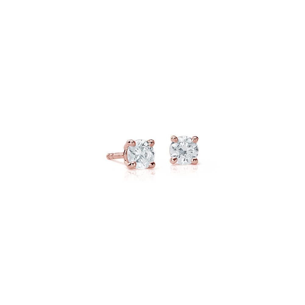 Dazzle yourself with these sparkling Suzy Levian stud earrings featuring two gorgeous white diamonds in a prong setting. These beautiful diamonds are hand set in 
14-karat rose gold, and weigh 0.50 ctw and are G-H, S1-S2 quality. These earrings have