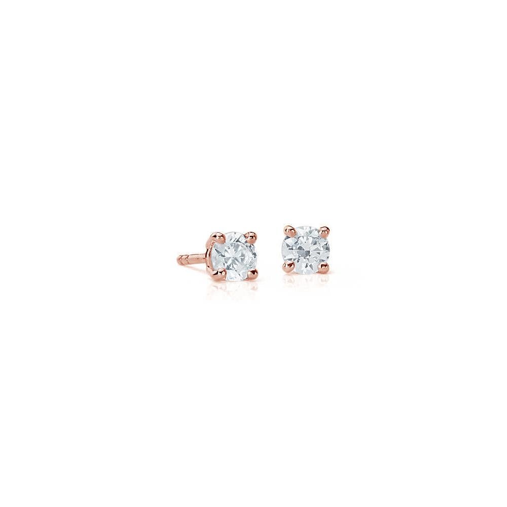 Dazzle yourself with these sparkling Suzy Levian stud earrings featuring two gorgeous white diamonds in a prong setting. These beautiful diamonds are hand set in 14-karat rose gold, and weigh 0.20 ctw and are G-H, S1-S2 quality. These earrings have
