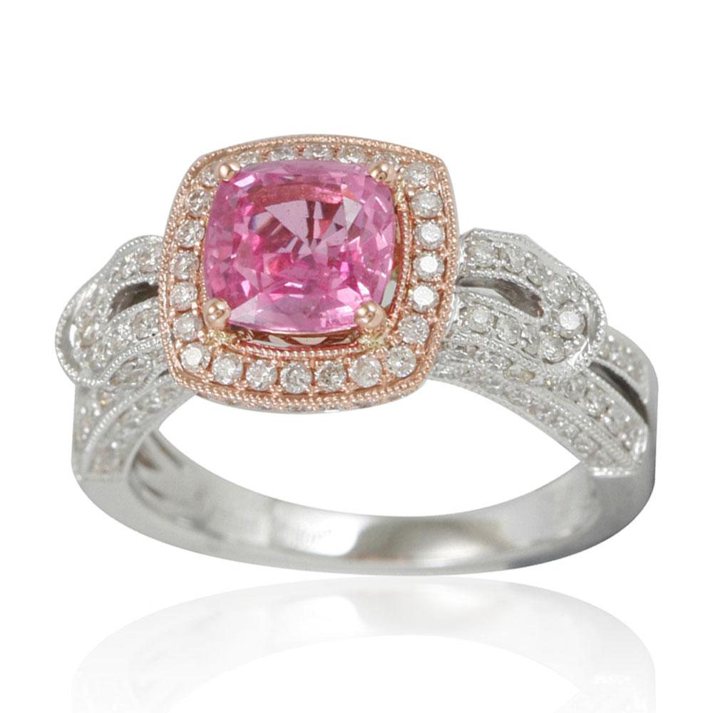 Elegance is the word that comes to mind seeing this Suzy Levian Limited Edition cocktail ring. The cushion-cut pink Ceylon sapphire (2.09ct) center stone is adorned by 134 round-cut white diamonds. These shimmering diamonds (.89TDW) enhance the