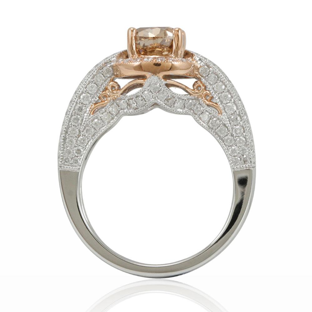 This delicious ring from the Suzy Levian Limited Edition collection features a brown diamond center stone (2.00 ct) in a 14k two-tone white and rose gold setting. An array of white diamonds (1.03cttw) accent the perfect two-tone style of the ring.