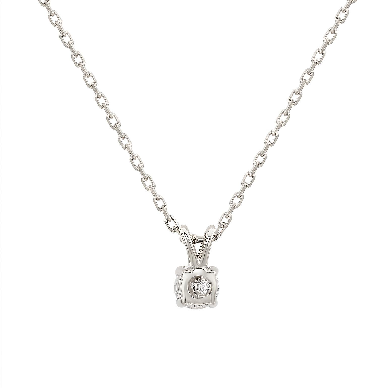 Add an elegant accent to your outfit with this sparkling Suzy Levian solitaire pendant necklace featuring a single gorgeous white diamonds in a split bail prong setting. The sparkling diamond are hand set in 14-karat white gold, and weigh 0.15ctw