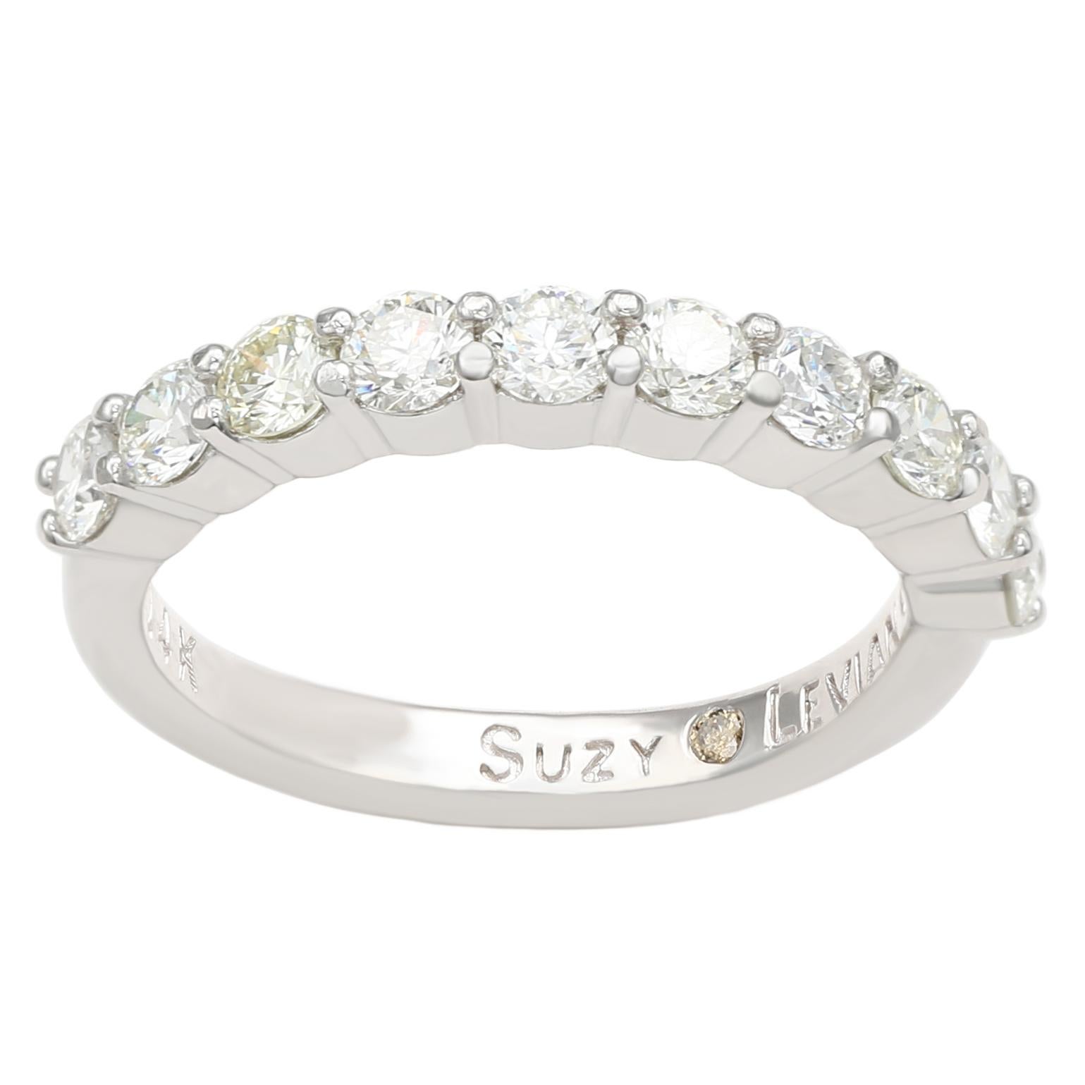 This elegant Suzy Levian diamond half eternity band features a total of ten round cut diamonds (G-H, S1-S2). The diamonds sparkle along half the eternity band, for a sparkle you can't miss with a comfort fit. Designed by Suzy Levian , this 14k white