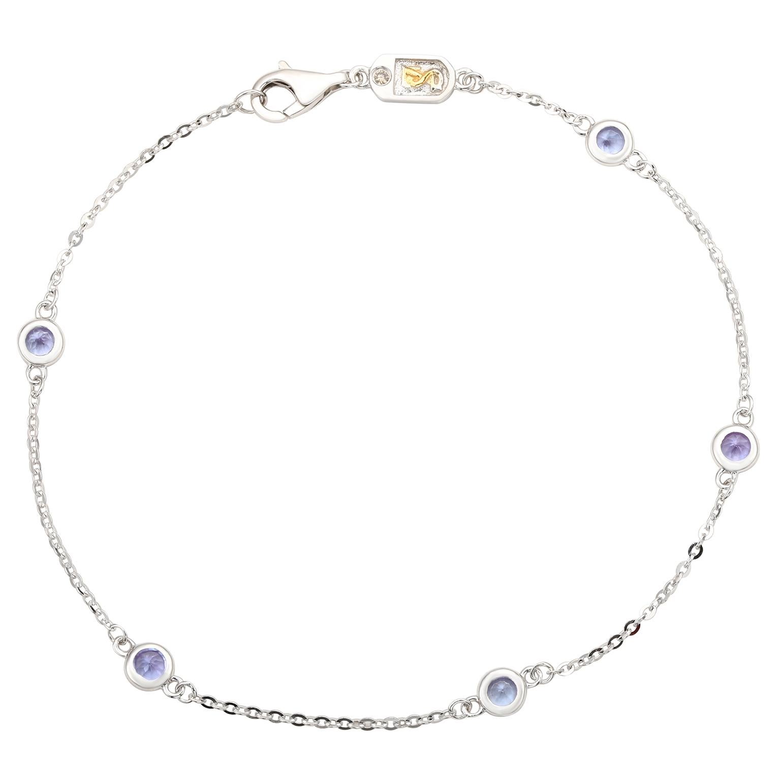 Adorn your hand with sparkling shimmers with this beautiful tanzanite station bracelet. This bracelet can be worn stackable with other bracelets or as a single bracelet, making it the perfect bracelet for every occasion. This bracelet features five