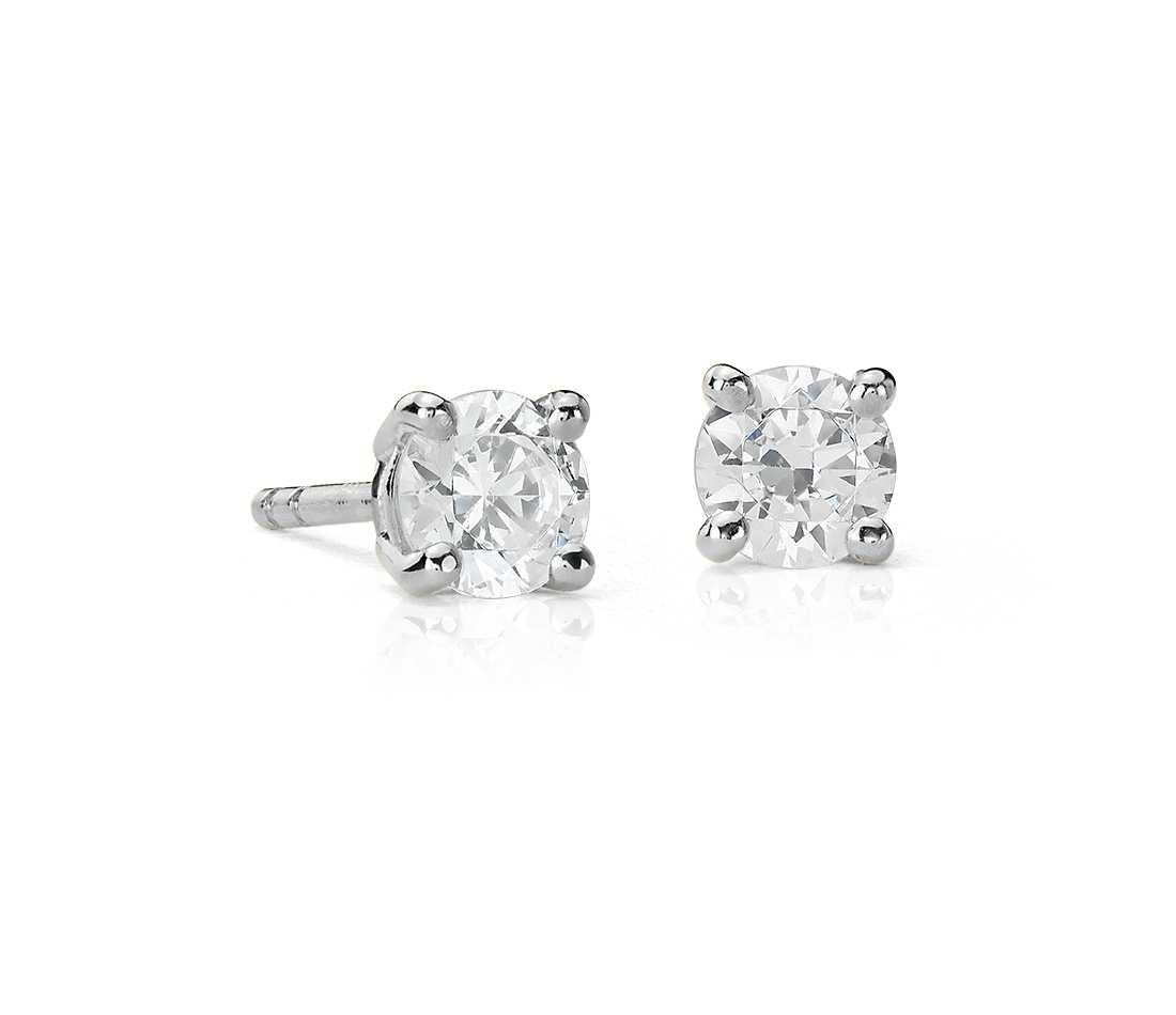 Add an elegant accent to your outfit with these sparkling stud earrings featuring two gorgeous white diamonds in a prong setting. Crafted in 14-karat white gold, these earrings have a high polish finish and butterfly clasp.

White Diamonds:
2