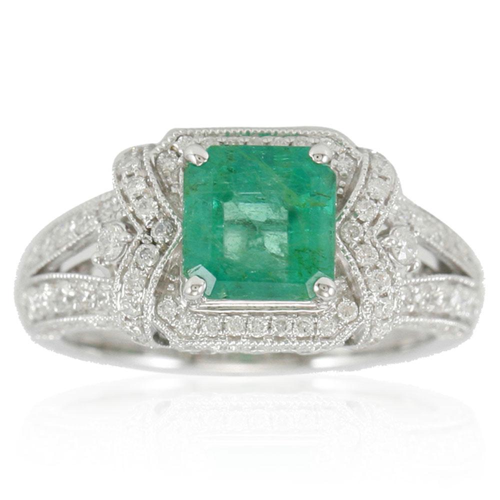 This spectacular ring from the Suzy Levian collection features a Colombian emerald gemstone held in a square shaped 14K white gold prong setting. An array of 114 side white diamonds (1.02ct)(SI1-SI2, G-H) accents the perfect white gold color of the