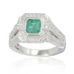 Suzy Levian 14 Karat White Gold Emerald Cut Colombian Emerald and Diamond Ring