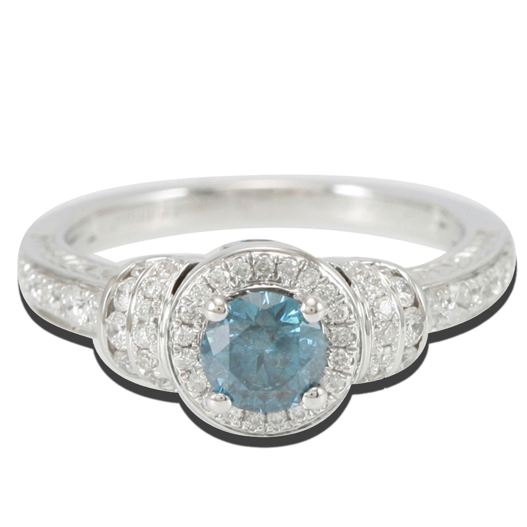 Centered by a .60ct blue diamond stone, this ring is accented with two bezel-set blue diamonds(.13ct) and 57 pave-set white diamonds. Crafted with 14k white gold, this ring shimmers with a lustrous high polish finish.
Suzy Levian is a guarantee