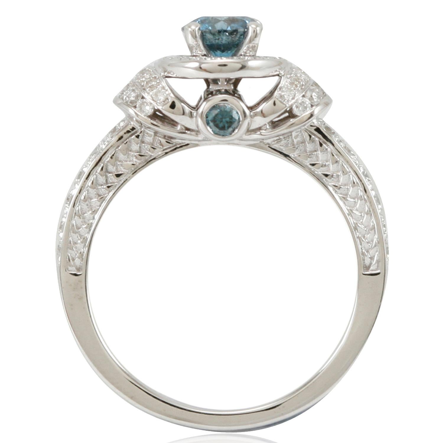 Centered by a .60ct blue diamond stone, this ring is accented with two bezel-set blue diamonds(.11ct) and 57 pave-set white diamonds. Crafted with 14k white gold, this ring shimmers with a lustrous high polish finish.
Suzy Levian is a guarantee