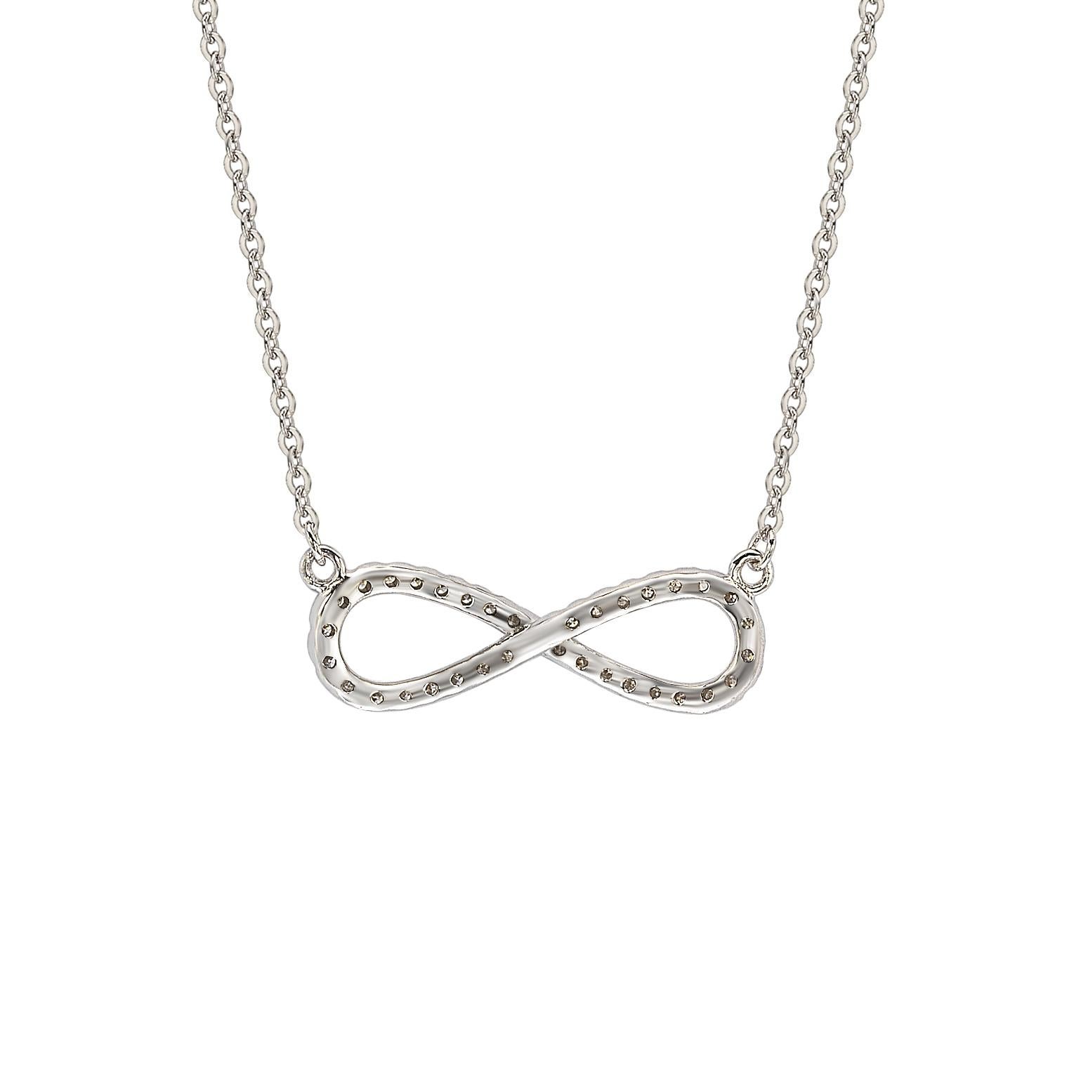 This elegant Suzy Levian solitaire infinity necklace displays round-cut diamonds on 14 karat white gold setting. This gorgeous infinity pendant has 39, 1 mm white round cut diamonds totaling .20 cttw. This infinity necklace can be perfect to wear