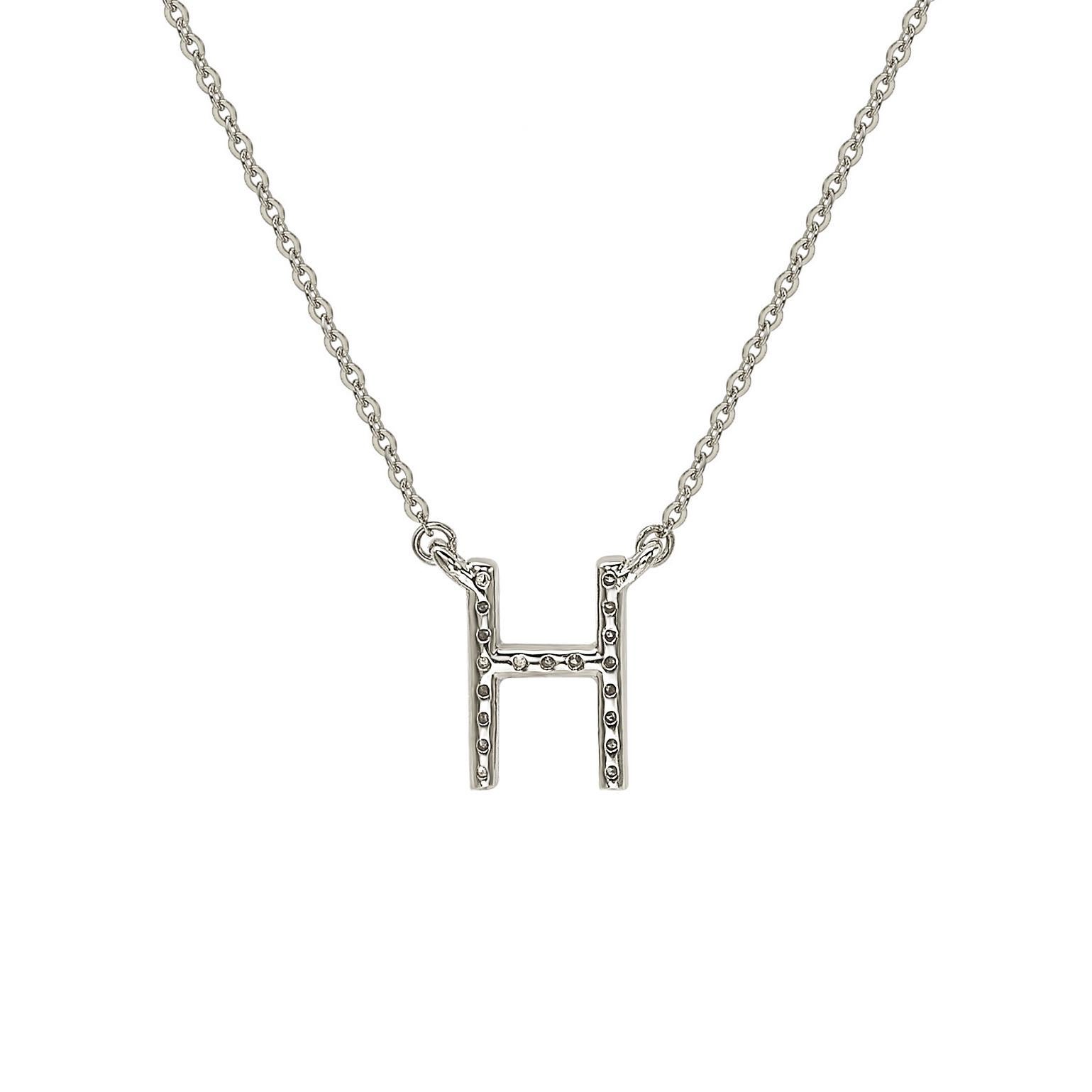 This breathtaking personalized Suzy Levian letter necklace features natural diamonds, hand-set in 14-Karat white gold. It's the perfect individualized gift to let someone special know you're thinking of them. Each letter necklace features a row of