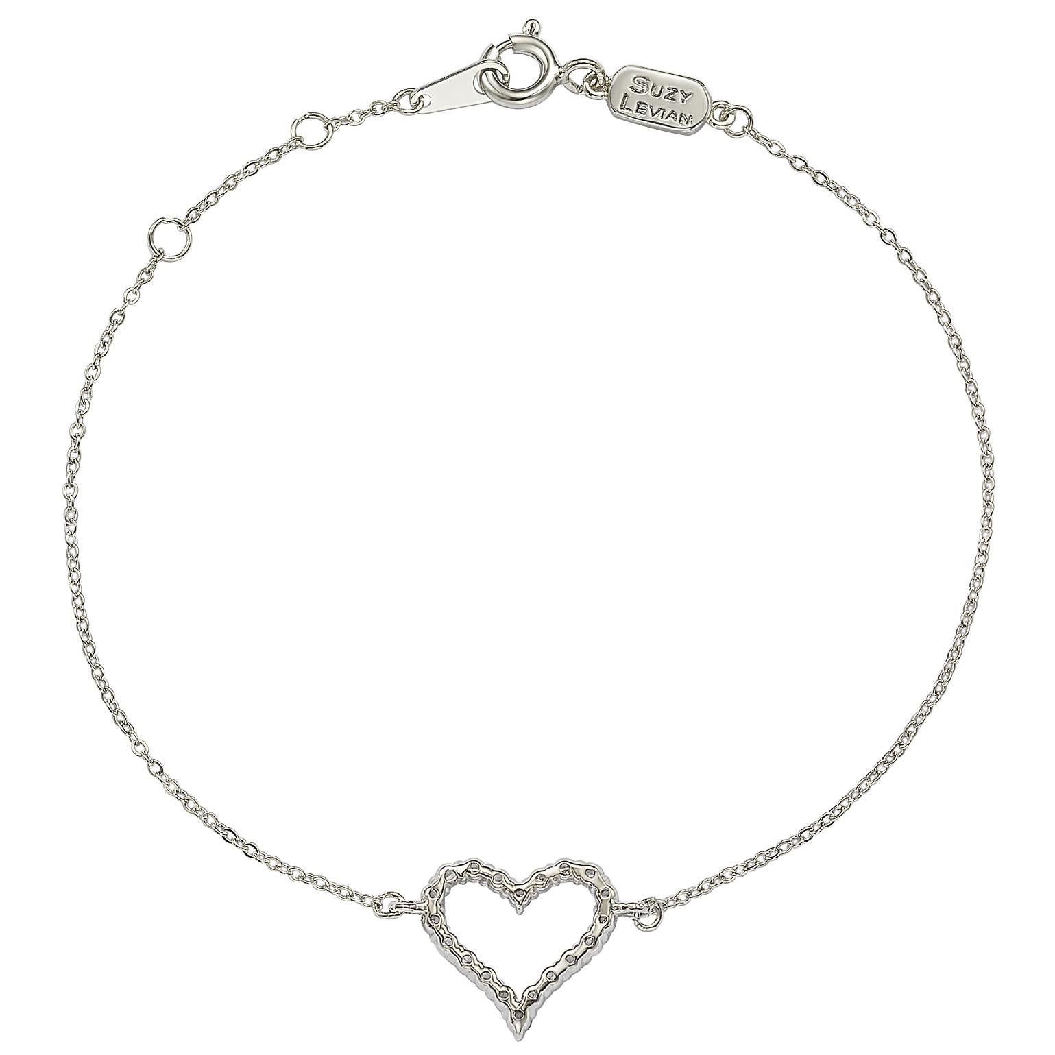 This elegant Suzy Levian heart solitaire bracelet features 19 diamonds, which are 1.4 mm size totals .24 cttw, all set in 14K white gold setting. Each diamond heart is attached to a chain that is secured with a spring ring closure with a yellow gold
