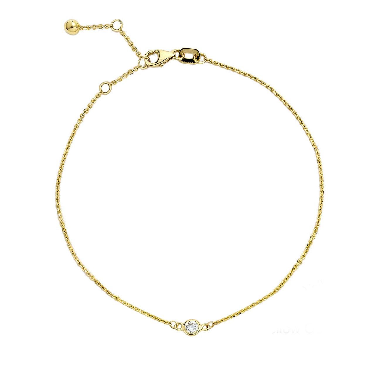 Add some sparkle to your wrist with this beautiful diamond solitaire bracelet by Suzy Levian. This magnificent bracelet boasts a brilliant round-cut diamond in an exquisite bezel adorned of 14-karat yellow gold. This bracelet features a high polish