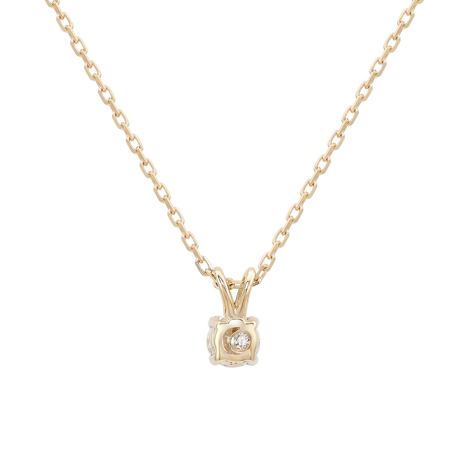 Add an elegant accent to your outfit with this sparkling Suzy Levian solitaire pendant necklace featuring a single gorgeous white diamonds in a split bail prong setting. The sparkling diamond are hand set in 14-karat yellow gold, and weigh 0.26ctw