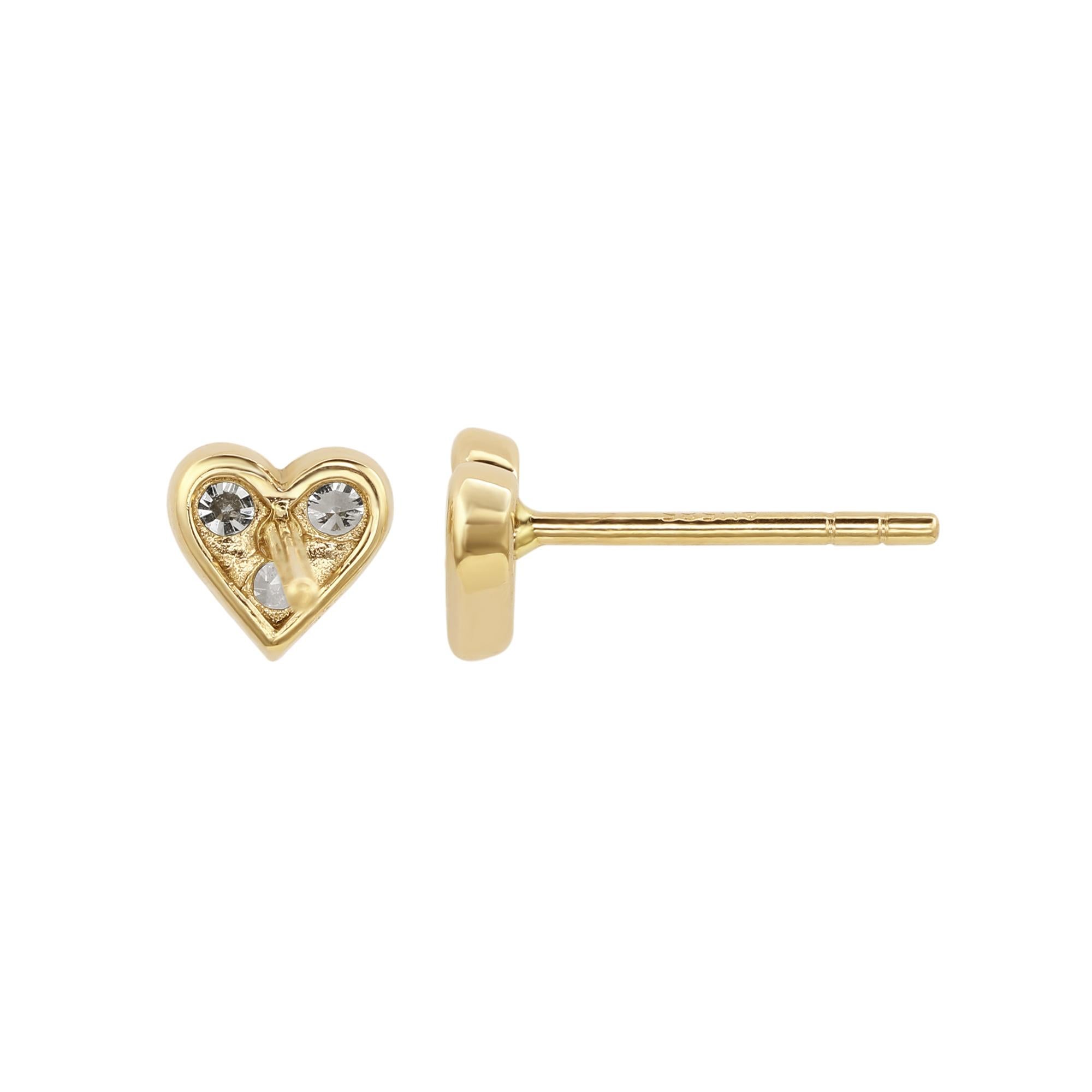 Add an elegant accent to your outfit with these sparkling Suzy Levian heart shape stud earrings featuring six round cut gorgeous white diamonds in a prong setting. The sparkling diamonds are hand set in 14-karat yellow gold, and weigh 0.30 cttw and