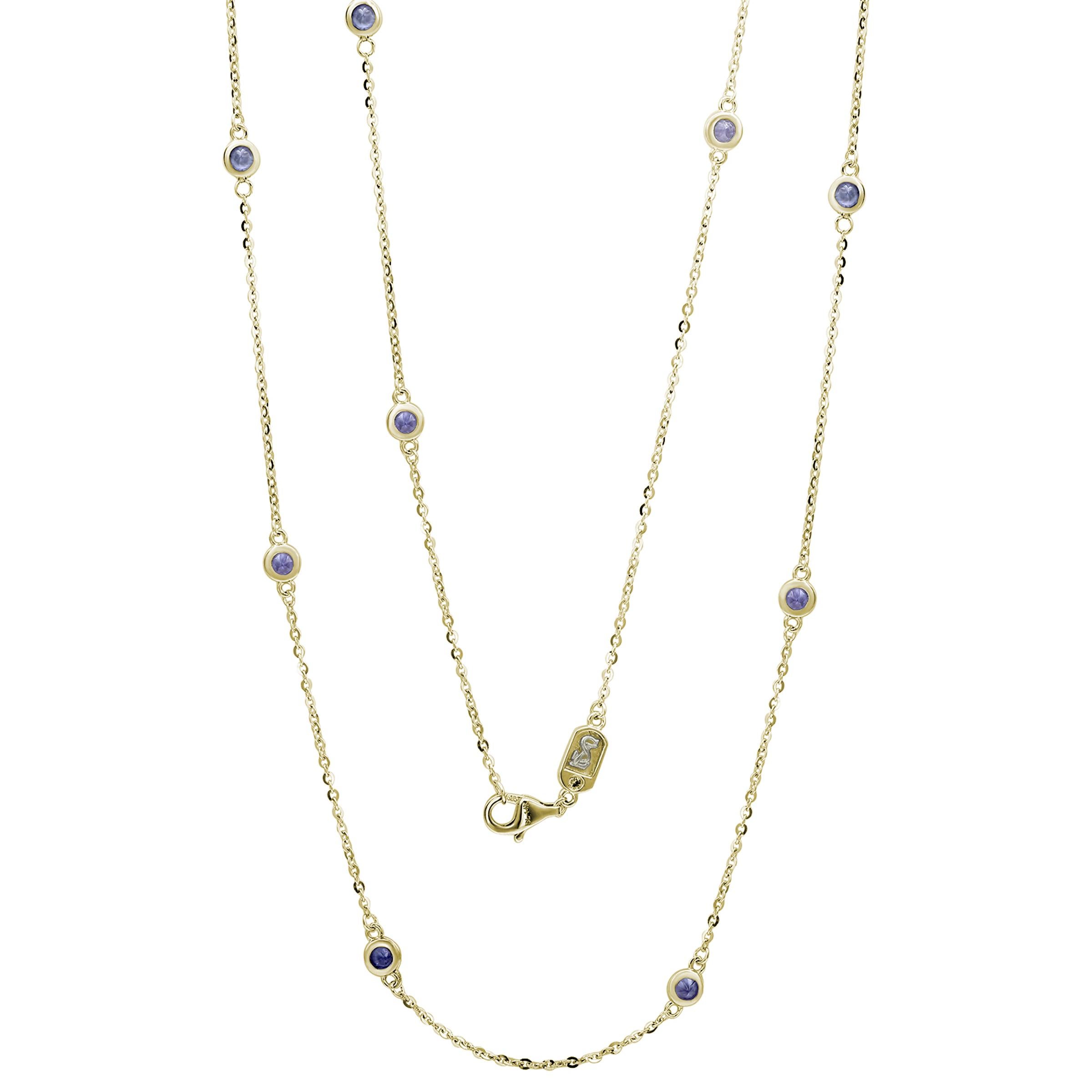 Adorn your neck with sparkling shimmers with this beautiful tanzanite station necklace. This necklace can be worn stackable with other necklaces or as a single necklace, making it the perfect necklace for every occasion. This necklace features nine